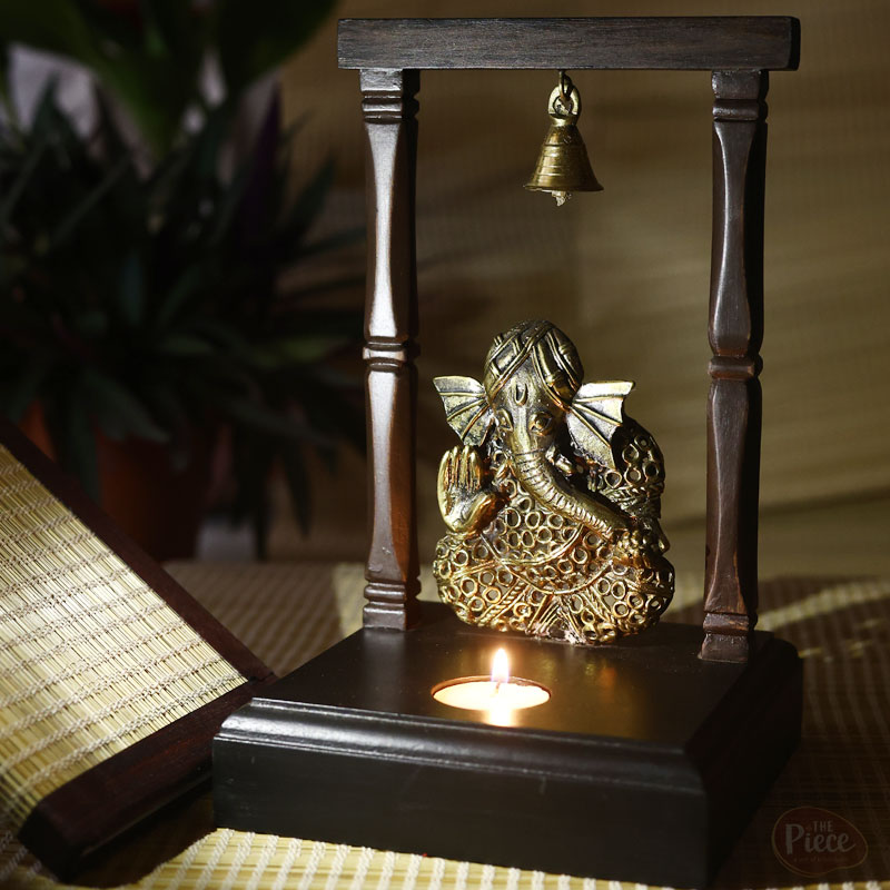 HANDCRAFTED DOKRA ART BRASS GANESH TEA LIGHT HOLDER WITH WOODEN FRAME - Image 3