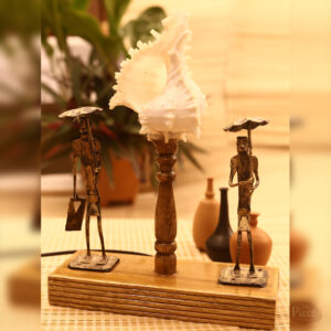 Handcrafted tribal shell table lamp with figurine design